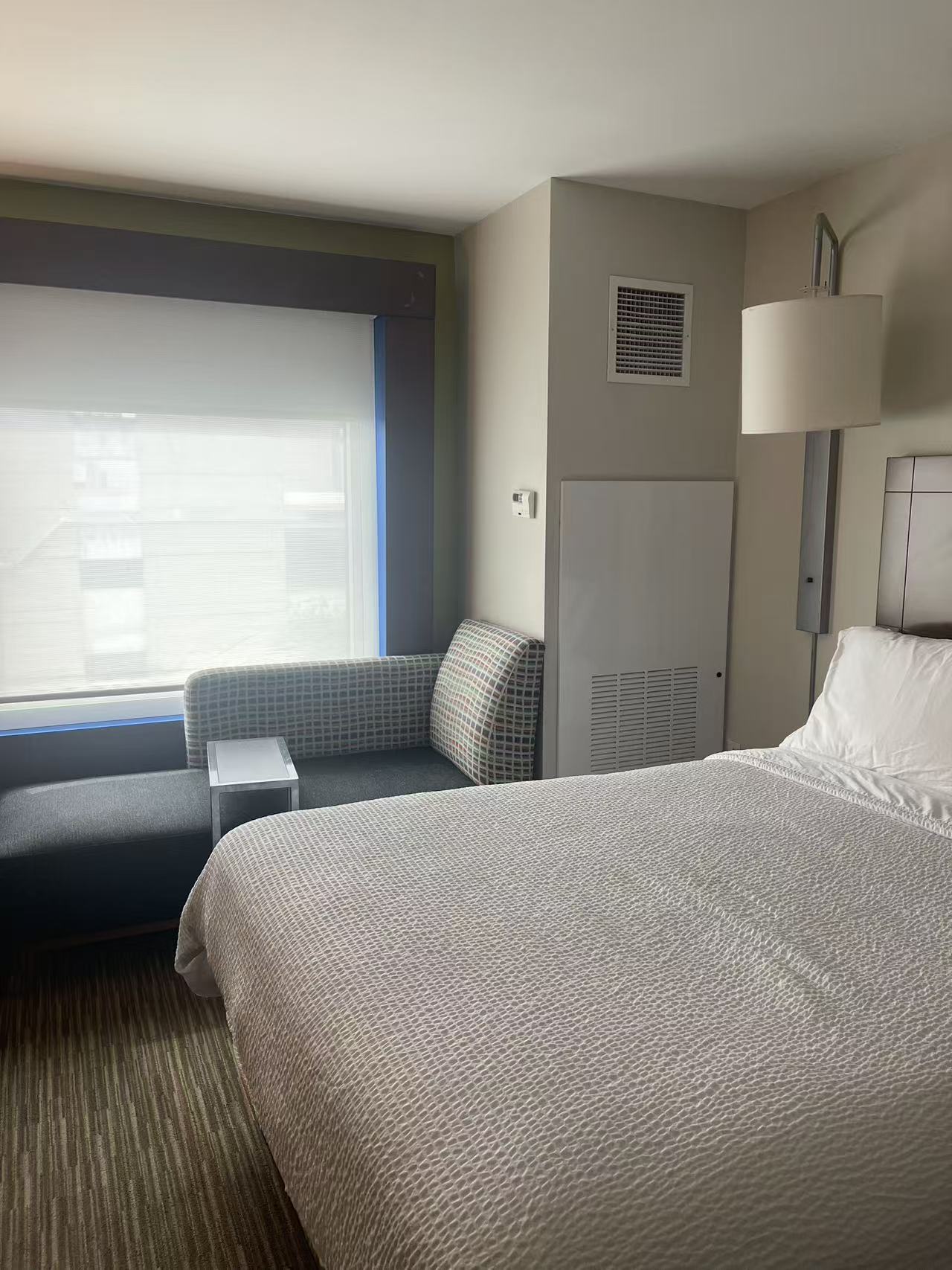 Hotel guest room with a vertical terminal enclosure